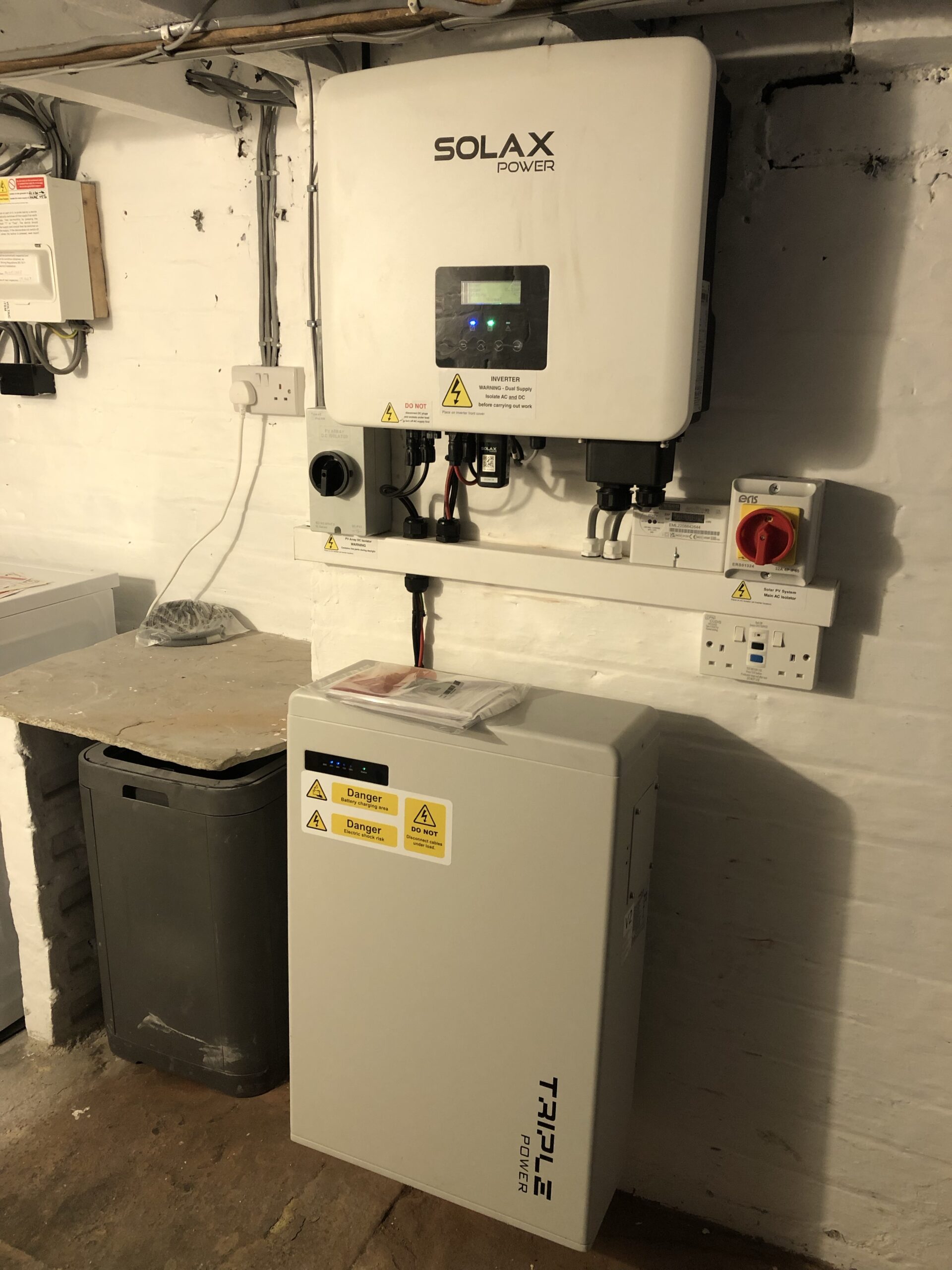 A photo of the solar inverter and battery in our cellar.