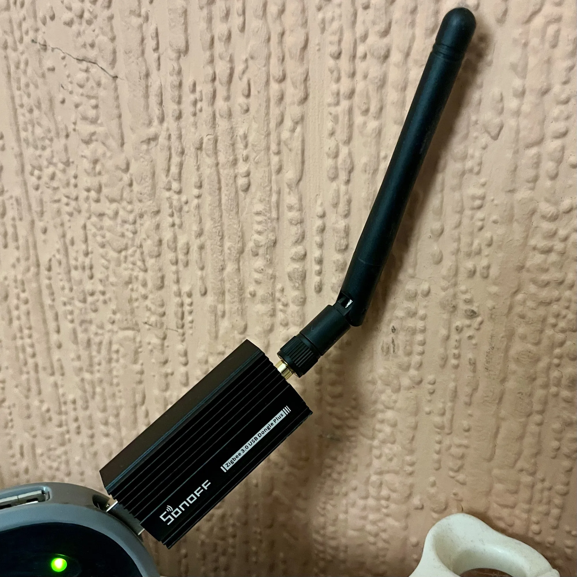 A photo of the Sonoff ZBDongle E which offers Zigbee and Thread support