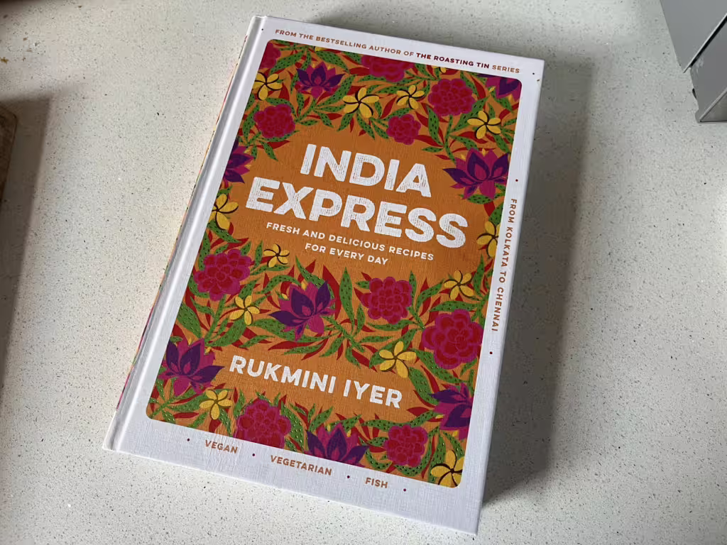 A photo of the cover of the India Express cookbook by Rukmini Iyer