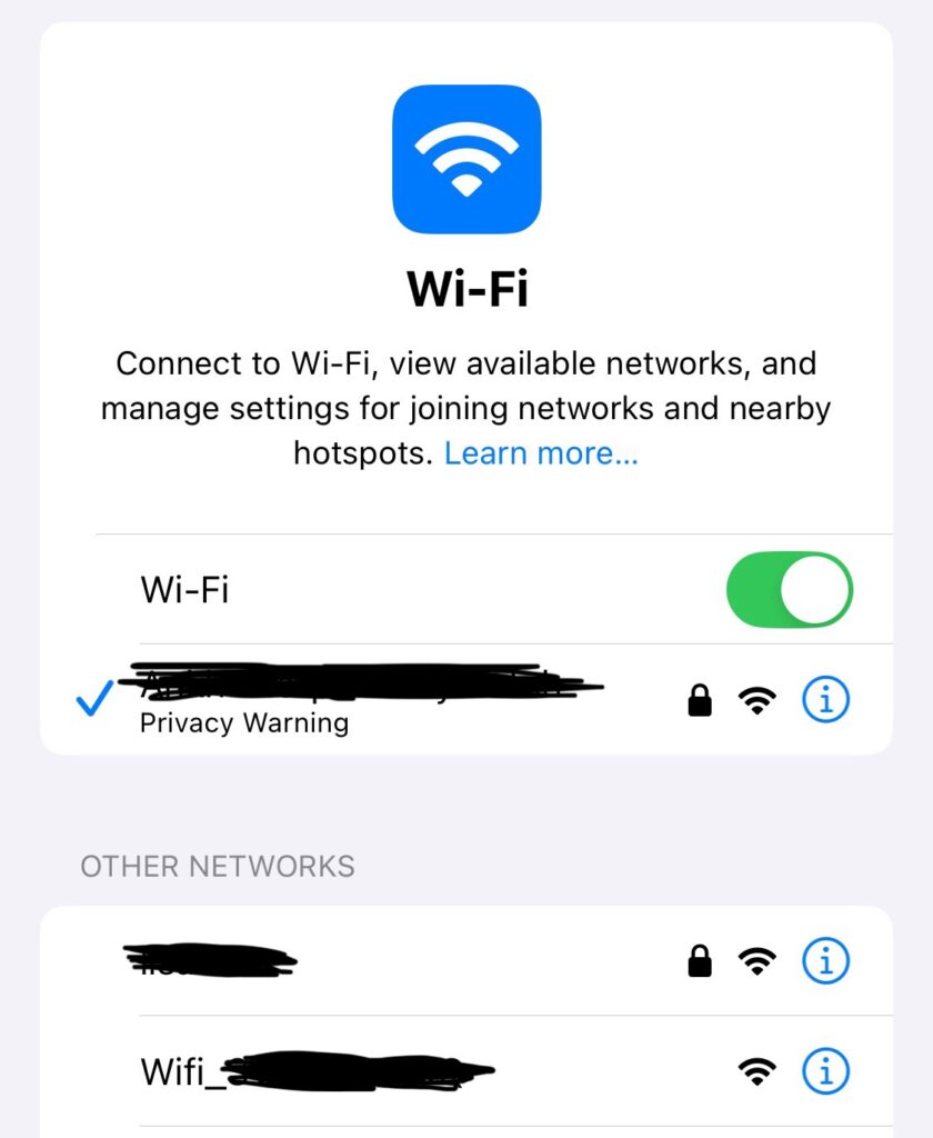 A screenshot of the Wi-Fi network selection screen on iOS 8, showing an unsecured network for the Solax inverter.
