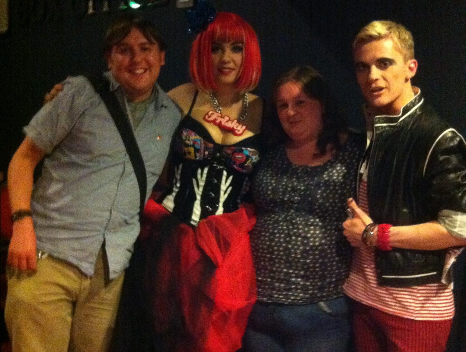 A photo of Neil and Christine posing with Frisky & Mannish
