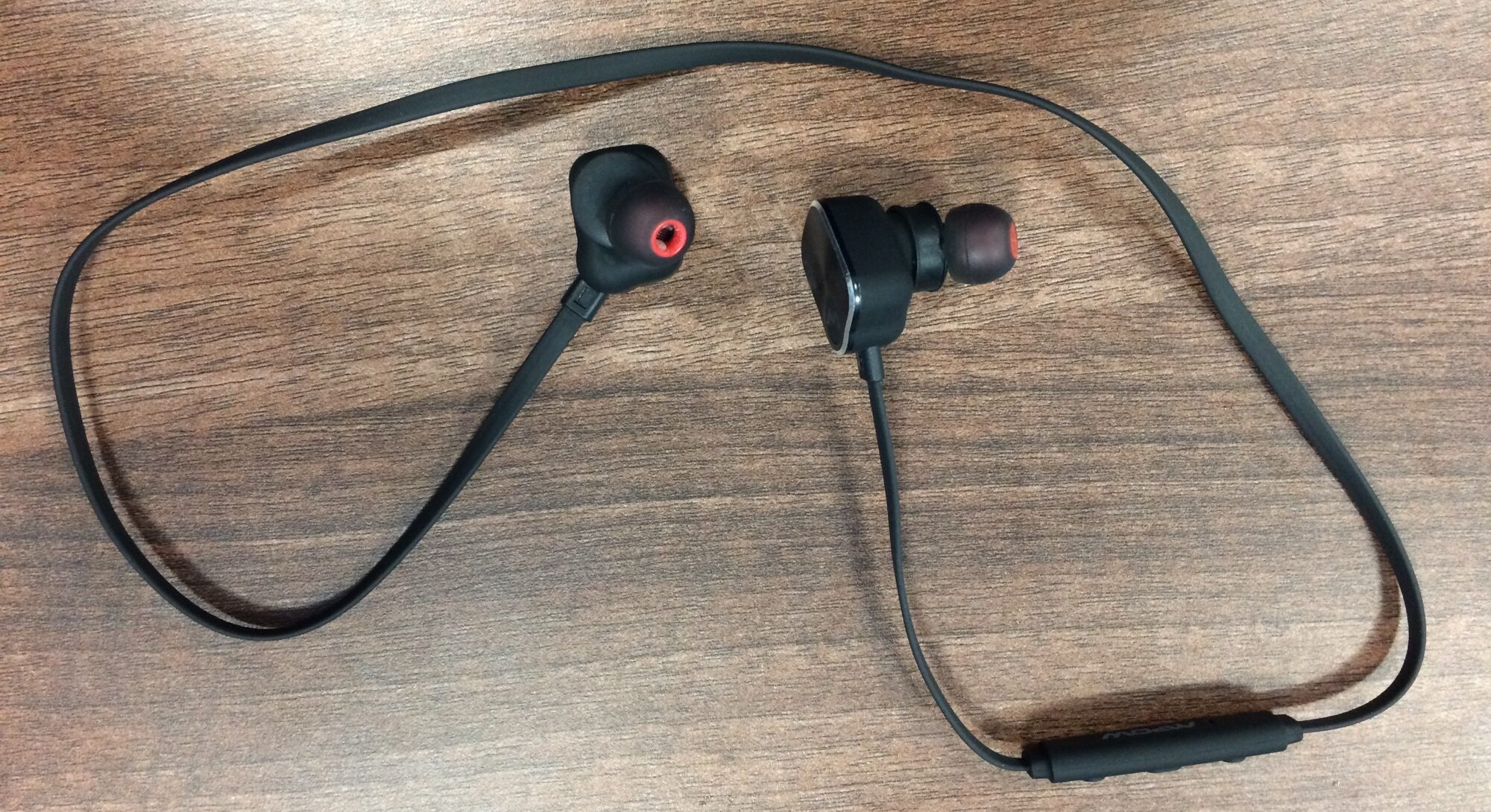 A photo of a mPow Magneto wireless Bluetooth headset