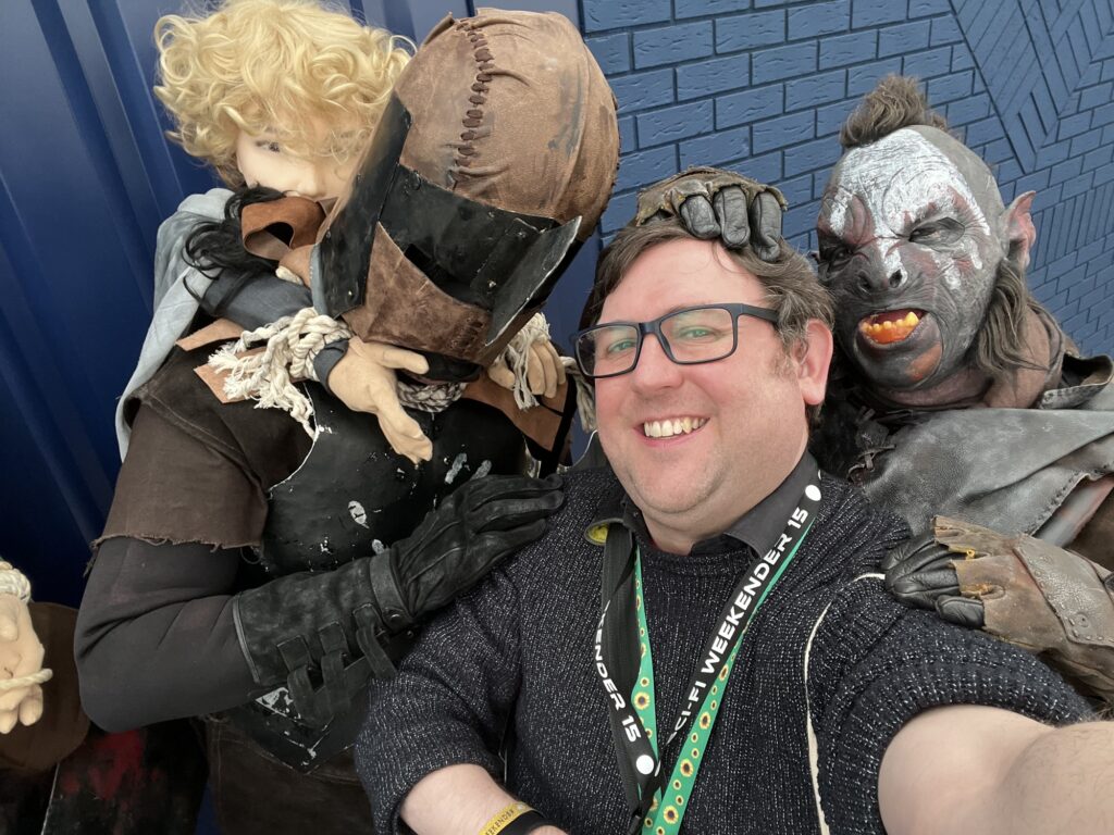 A photo of Neil being molested by Orcs