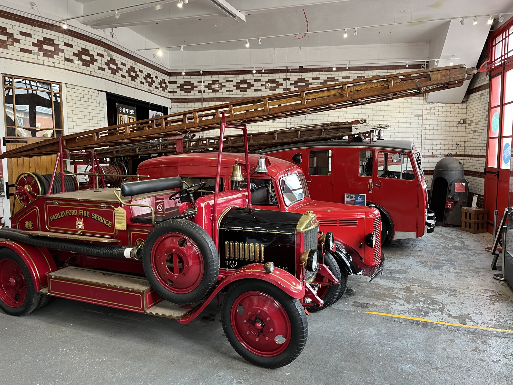 A photo of some old fire engines at the National Emergency Services Museum in Sheffield