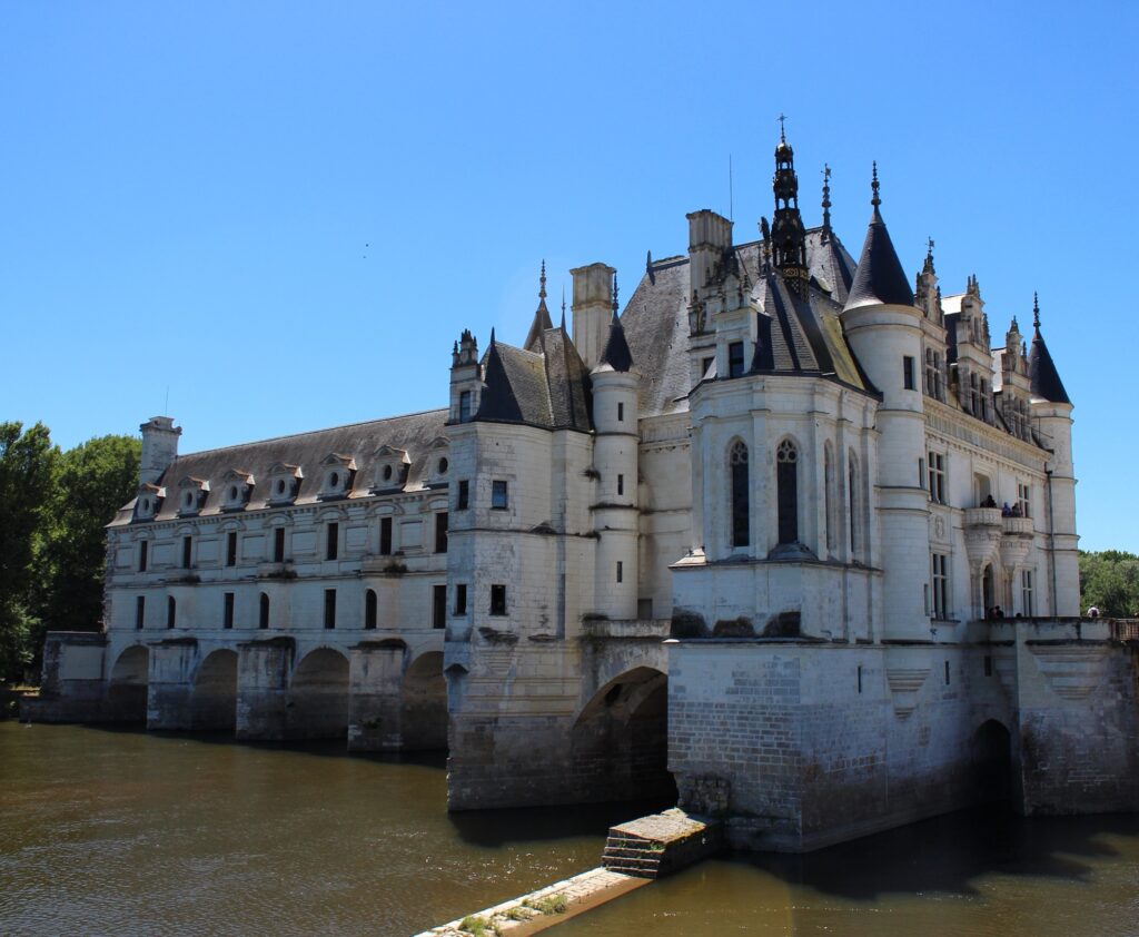 A photo of Château de Chenonceau which spans the River Cher in France