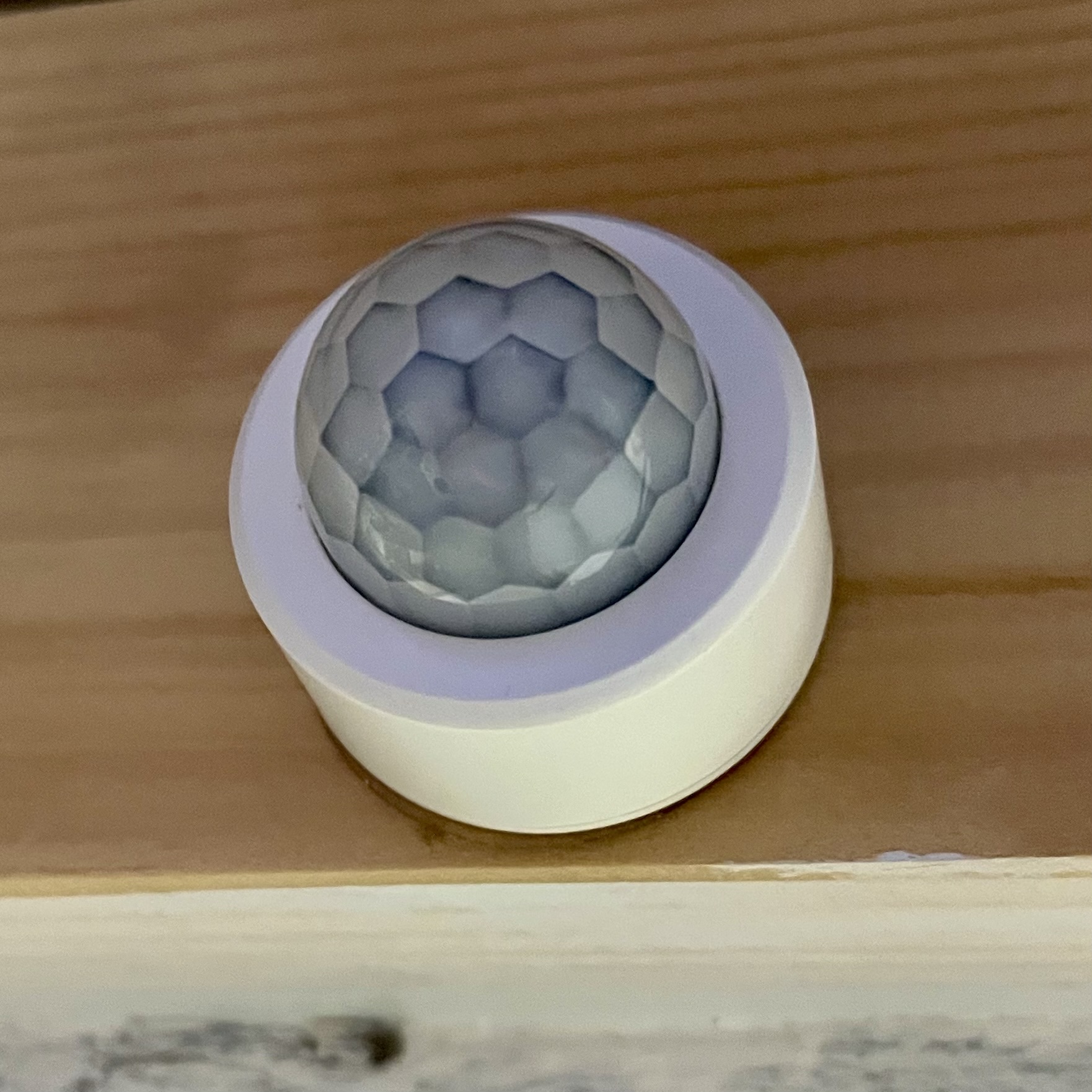 A photo of a Zigbee PIR motion sensor