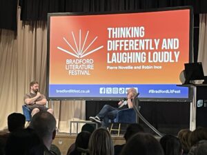 Pierre Novellie (left) and Robin Ince (right) taking part in a discussion about Thinking Differently and Laughing Loudly at Bradford Literature Festival