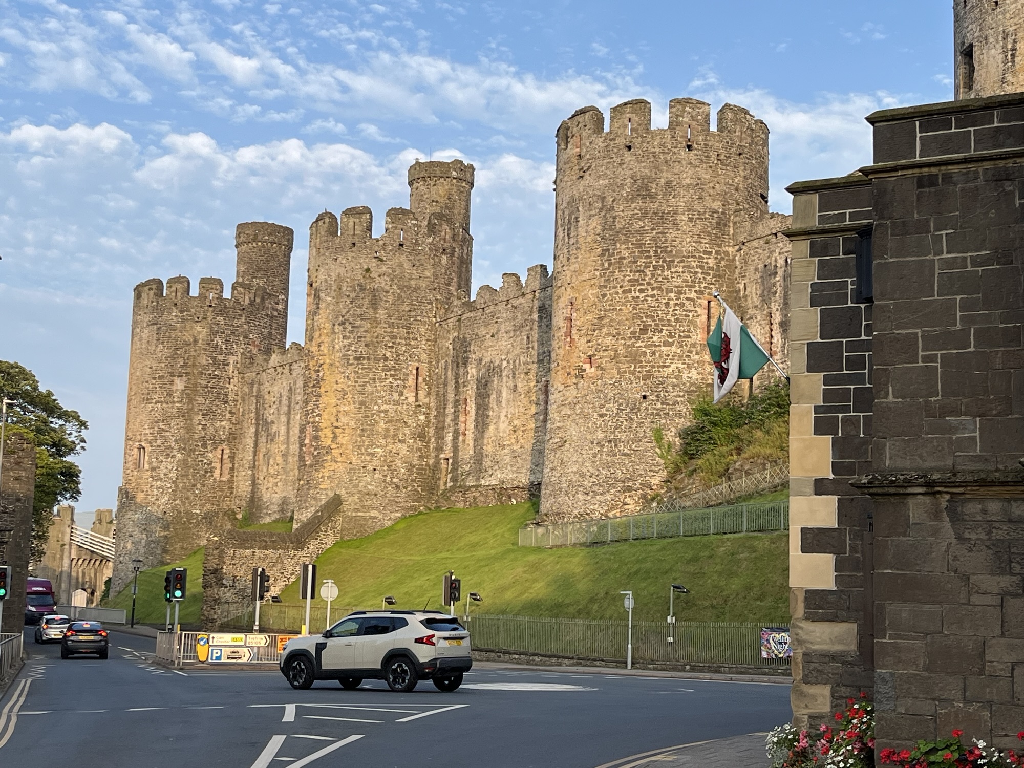 A photo of Conwy castle taken through the gap in the town wall.