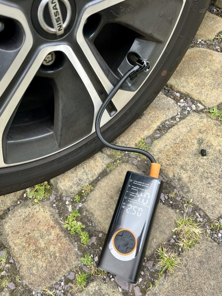 The Higoom car air pump in use inflating my car's tyres