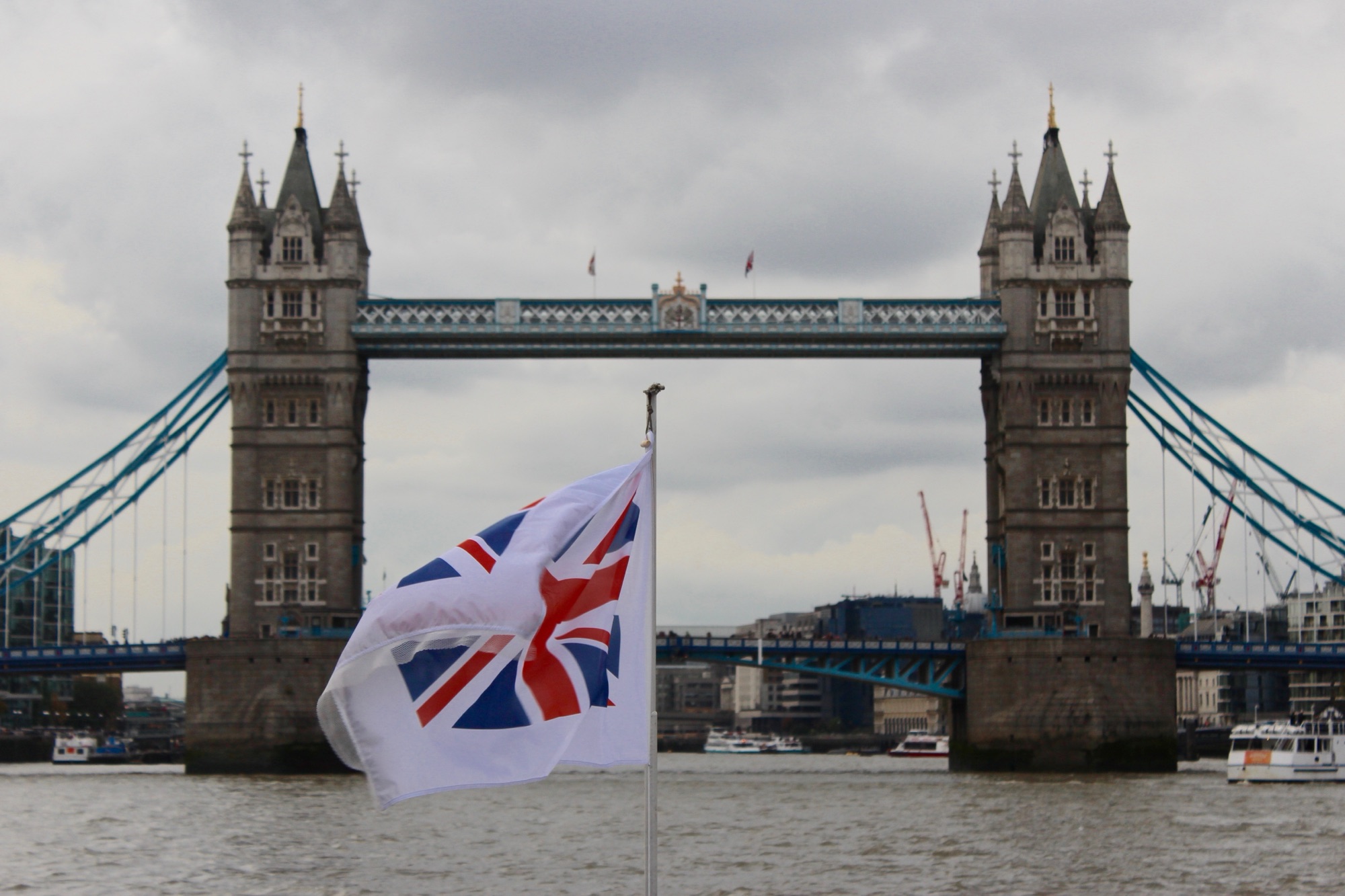 A photo of the Union Flag flying in front of Tower Bridge in London