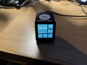 A photo of my GeekMagic SmallTV Pro showing a Home Assistant dashboard