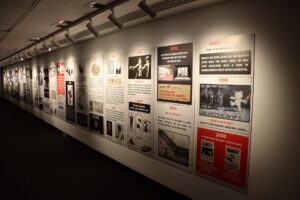 A timeline at the start of the Banksy Limitless immersive experience