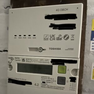 A photo of our electric meter with a new 4G communications hub on top.